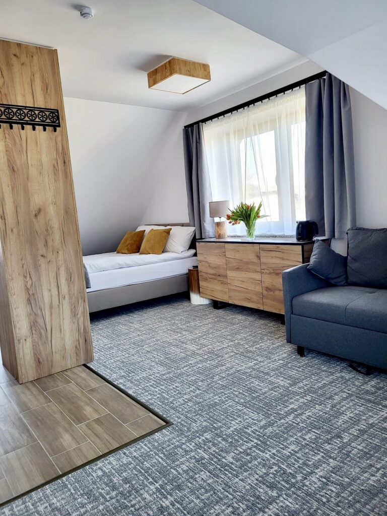 Złoty Widok room – sofa by the window
